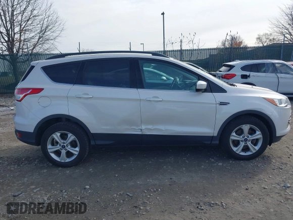2014 Ford Escape SE with VIN 1FMCU0GX1EUB23743, listed as a IAAI auction lot 40893420 with 74,506 mi miles. Bid and sale history available at carsss.com. Image 12.
