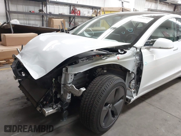 2020 Tesla Model 3 Standard Range Plus with VIN 5YJ3E1EA7LF805828, listed as a IAAI auction lot 41841505 with 44,946 mi miles and . Bid and sale history available at DreamBid. Image 6.