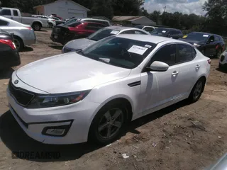2015 Kia Optima LX with VIN KNAGM4A70F5645049, listed as a IAAI auction lot 42758383 with 214,934 mi miles and . Bid and sale history available at DreamBid. Image 2.