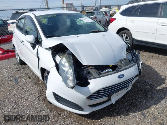 2018 Ford Fiesta SE z VIN 3FADP4EJXJM100407, wystawiony jako IAAI lot #42285374 z przebiegiem 90 261 mil mil oraz . Historia ofert i sprzedaży dostępna na DreamBid. Obrazek 6.