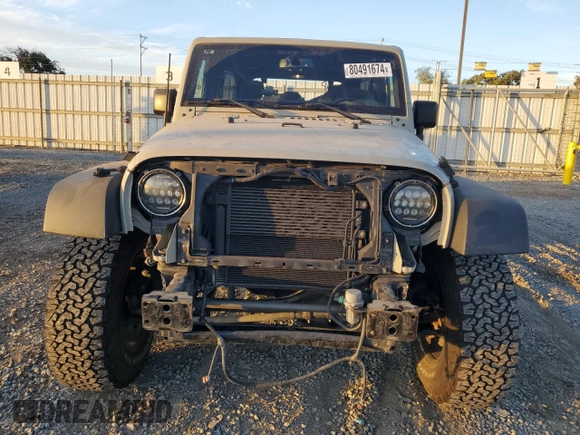 2018 Jeep Wrangler JK Unlimited Sport S with VIN 1C4BJWDG3JL907051, listed as a Copart auction lot 80491674 with 69,868 mi miles and Salvage Title. Bid and sale history available at carsss.com. Image 5.