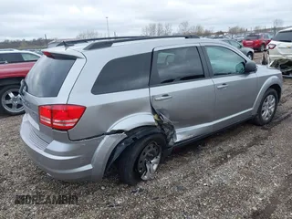 2016 Dodge Journey SE with VIN 3C4PDCAB4GT230643, listed as a IAAI auction lot 39127555 with 102,756 mi miles. Bid and sale history available at carsss.com. Image 4.