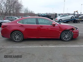 2016 Lexus ES 330 z VIN 58ABK1GG5GU024281, wystawiony jako IAAI lot #41913263 z przebiegiem 87 890 mil mil oraz . Historia ofert i sprzedaży dostępna na DreamBid. Obrazek 13.