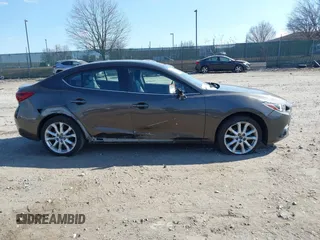 2014 Mazda 3 S Touring with VIN JM1BM1V3XE1147675, listed as a IAAI auction lot 41676716 with Not Provided miles and . Bid and sale history available at DreamBid. Image 12.