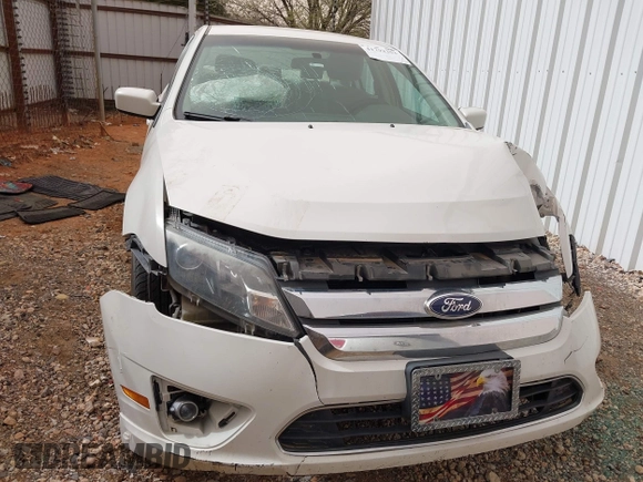 2012 Ford Fusion SE z VIN 3FAHP0HA3CR285217, wystawiony jako IAAI lot #41792353 z przebiegiem 190 916 mil mil oraz . Historia ofert i sprzedaży dostępna na DreamBid. Obrazek 12.