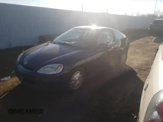 2006 Honda Insight z VIN JHMZE135X6S000461, wystawiony jako Copart lot #81187694 z przebiegiem 248 796 mil mil oraz Szkoda całkowita • Salvage title. Historia ofert i sprzedaży dostępna na DreamBid. Obrazek 1.