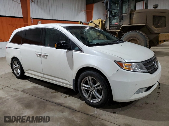 2012 Honda Odyssey Touring with VIN 5FNRL5H94CB508363, listed as a Copart auction lot 42777305 with 158,040 mi miles and Salvage Title. Bid and sale history available at DreamBid. Image 4.