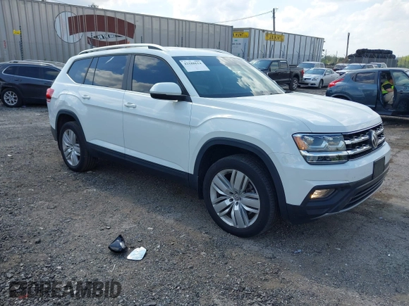 2019 Volkswagen Atlas SE z VIN 1V2UR2CAXKC539779, wystawiony jako IAAI lot #42188614 z przebiegiem 49 994 mil mil oraz . Historia ofert i sprzedaży dostępna na DreamBid. Obrazek 1.