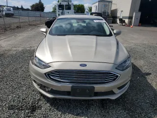 2017 Ford Fusion Hybrid SE with VIN 3FA6P0LU8HR319135, listed as a Copart auction lot 57462035 with 75,288 mi miles and Salvage title. Bid and sale history available at DreamBid. Image 5.
