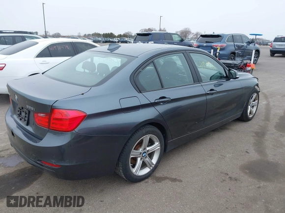 2015 BMW 3 Series 328i xDrive with VIN WBA3B3G53FNR88717, listed as a IAAI auction lot 41941261 with 107,947 mi miles and . Bid and sale history available at DreamBid. Image 4.