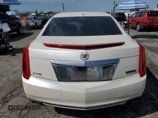 2014 Cadillac XTS Premium with VIN 2G61P5S36E9305491, listed as a Copart auction lot 44404425 with 104,710 mi miles and Salvage Title. Bid and sale history available at DreamBid. Image 6.