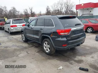 2013 Jeep Grand Cherokee Laredo with VIN 1C4RJFAG9DC506238, listed as a IAAI auction lot 41800981 with 172,676 mi miles. Bid and sale history available at carsss.com. Image 3.