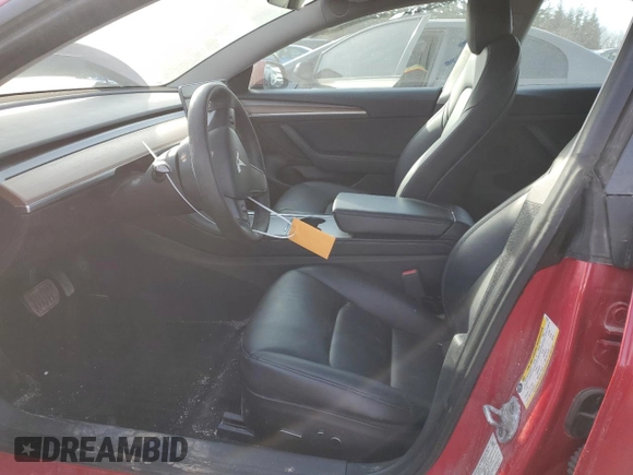 2022 Tesla Model 3 with VIN 5YJ3E1EA8NF167107, listed as a Copart auction lot 48128335 with 218,144 mi miles and Salvage Title. Bid and sale history available at carsss.com. Image 7.