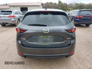 2020 Mazda CX-5 Touring with VIN JM3KFBCM2L0850855, listed as a IAAI auction lot 42147339 with 75,955 mi miles and . Bid and sale history available at carsss.com. Image 16.