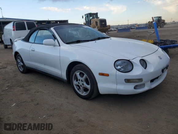 1998 Toyota Celica GT z VIN JT5FG02T2W0047564, wystawiony jako Copart lot #75727344 z przebiegiem 225 802 mil mil oraz Szkoda całkowita • Salvage title. Historia ofert i sprzedaży dostępna na DreamBid. Obrazek 4.