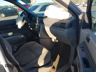 2005 Ford Freestar S z VIN 2FMZA50615BA37923, wystawiony jako IAAI lot #40896205 z przebiegiem 229 168 mil mil oraz . Historia ofert i sprzedaży dostępna na DreamBid. Obrazek 5.