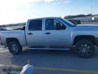 2012 Chevrolet Silverado 1500 LT with VIN 1GCPKSE70CF141159, listed as a IAAI auction lot 40953651 with 141,375 mi miles. Bid and sale history available at carsss.com. Image 13.