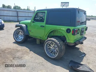 2018 Jeep Wrangler Sport with VIN 1C4GJXAG1JW271695, listed as a IAAI auction lot 42472603 with 105,460 mi miles and . Bid and sale history available at DreamBid. Image 3.