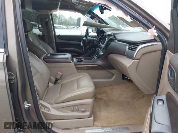 2015 Chevrolet Suburban LT z VIN 1GNSCJKC6FR675585, wystawiony jako IAAI lot #41510570 z przebiegiem 156 818 mil mil oraz . Historia ofert i sprzedaży dostępna na DreamBid. Obrazek 5.