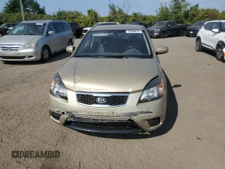 2011 Kia Rio with VIN KNADH4B38B6725531, listed as a Copart auction lot 72389974 with 124,315 mi miles and Salvage Title. Bid and sale history available at DreamBid. Image 5.