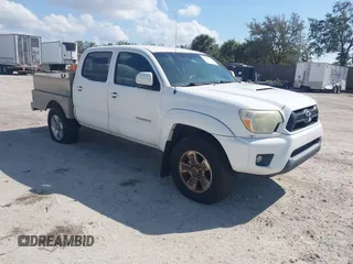 2014 Toyota Tacoma PreRunner with VIN 3TMJU4GN2EM169071, listed as a IAAI auction lot 41543601 with 304,594 mi miles. Bid and sale history available at carsss.com. Image 1.