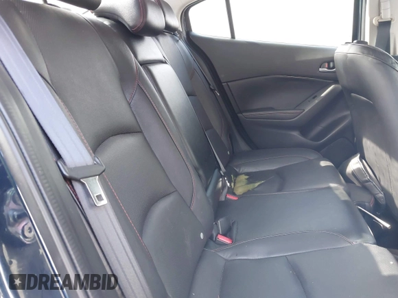 2015 Mazda 3 S Grand Touring z VIN JM1BM1W35F1238188, wystawiony jako IAAI lot #41206030 z przebiegiem 316 542 mil mil oraz . Historia ofert i sprzedaży dostępna na DreamBid. Obrazek 8.