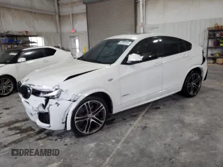2015 BMW X4 xDrive35i with VIN 5UXXW5C5XF0E88255, listed as a Copart auction lot 82968554 with 83,954 mi miles and Salvage Title. Bid and sale history available at carsss.com. Image 1.