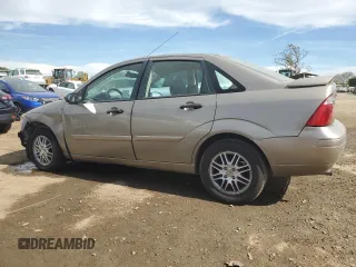 2005 Ford Focus S with VIN 1FAFP34NX5W263944, listed as a Copart auction lot 52973945 with 201,348 mi miles and Salvage Title. Bid and sale history available at carsss.com. Image 2.