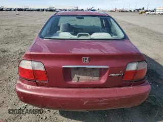 1996 Honda Accord LX with VIN 1HGCD563XTA266206, listed as a Copart auction lot 48601005 with 302,329 mi miles and Salvage Title. Bid and sale history available at DreamBid. Image 6.