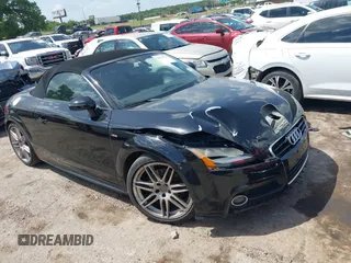 2014 Audi TT Premium Plus with VIN TRUSFAFK3E1000524, listed as a IAAI auction lot 42539787 with 94,665 mi miles and . Bid and sale history available at DreamBid. Image 1.