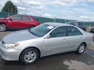 2005 Toyota Camry LE with VIN 4T1BF30K35U608097, listed as a IAAI auction lot 41908838 with 75,601 mi miles and . Bid and sale history available at DreamBid. Image 6.