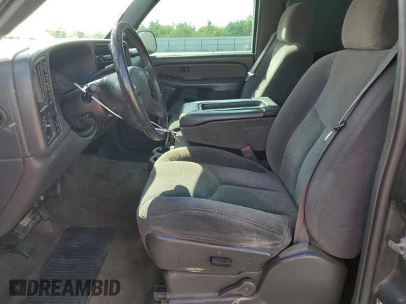 2005 Chevrolet Silverado 1500 LT with VIN 2GCEK13TX51247047, listed as a Copart auction lot 52769025 with 201,593 mi miles and Salvage Title. Bid and sale history available at DreamBid. Image 7.