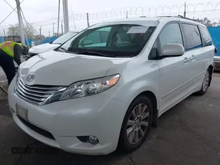 2011 Toyota Sienna XLE AAS with VIN 5TDYK3DC8BS148948, listed as a IAAI auction lot 41806293 with 144,645 mi miles and . Bid and sale history available at DreamBid. Image 2.