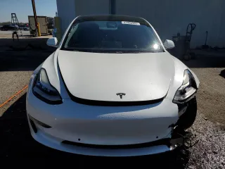 2020 Tesla Model 3 Standard Range Plus with VIN 5YJ3E1EA6LF661513, listed as a Copart auction lot 47008985 with 128,362 mi miles and Non Repairable. Bid and sale history available at DreamBid. Image 5.