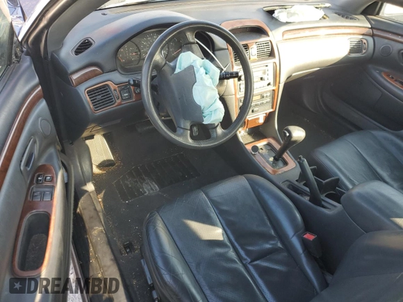 1999 Toyota Solara SE with VIN 2T1CF22P7XC260431, listed as a Copart auction lot 45150115 with 105,635 mi miles and Salvage Title. Bid and sale history available at DreamBid. Image 8.