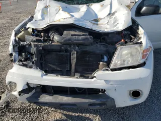 2014 Nissan Frontier S with VIN 1N6AD0ER7EN752186, listed as a Copart auction lot 87308234 with 287,851 mi miles and Salvage title. Bid and sale history available at DreamBid. Image 13.