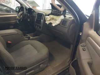 2003 Mercury Mountaineer Convenience z VIN 4M2ZU86W03UJ16828, wystawiony jako IAAI lot #41580919 z przebiegiem 148 968 mil mil oraz . Historia ofert i sprzedaży dostępna na DreamBid. Obrazek 5.