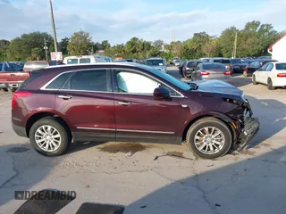 2018 Cadillac XT5 FWD with VIN 1GYKNARS6JZ179706, listed as a IAAI auction lot 41195570 with 80,676 mi miles. Bid and sale history available at carsss.com. Image 14.