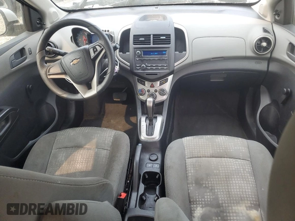 2015 Chevrolet Sonic LS with VIN 1G1JA5SH6F4152196, listed as a Copart auction lot 59096455 with 128,113 mi miles and Salvage title. Bid and sale history available at DreamBid. Image 8.