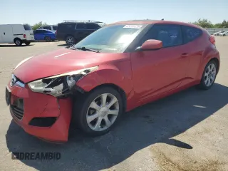 2013 Hyundai Veloster w/Gray Int с VIN KMHTC6AD2DU173280, выставлен на аукционе Copart как лот 65266655 с пробегом 186 588 миль миль и Списание • Salvage title. История ставок и продаж доступна на DreamBid. Изображение 1.
