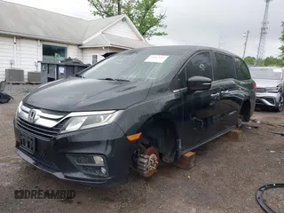 2018 Honda Odyssey EX-L z VIN 5FNRL6H71JB093357, wystawiony jako IAAI lot #42083895 z przebiegiem 194 211 mil mil oraz . Historia ofert i sprzedaży dostępna na DreamBid. Obrazek 6.