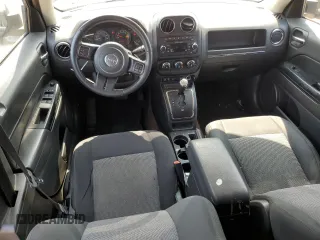 2014 Jeep Patriot Latitude with VIN 1C4NJRFB3ED761587, listed as a Copart auction lot 60554245 with 138,763 mi miles and Salvage title. Bid and sale history available at DreamBid. Image 8.