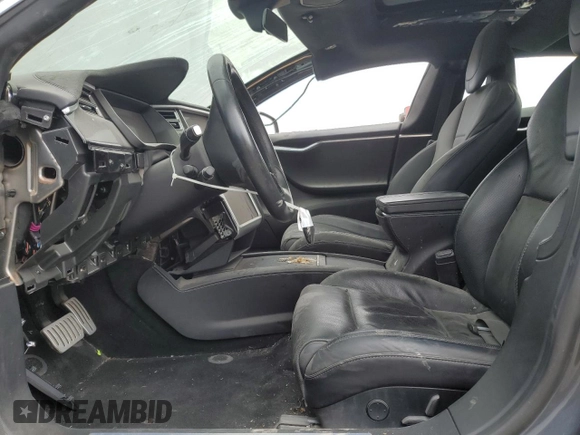 2016 Tesla Model S 90D z VIN 5YJSA1E41GF171522, wystawiony jako Copart lot #59966545 z przebiegiem Nie podano mil oraz Szkoda całkowita • Salvage title. Historia ofert i sprzedaży dostępna na DreamBid. Obrazek 7.