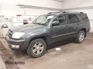 2003 Toyota 4Runner SR5 with VIN JTEBU14R630018160, listed as a IAAI auction lot 42145312 with 296,865 mi miles and . Bid and sale history available at DreamBid. Image 2.