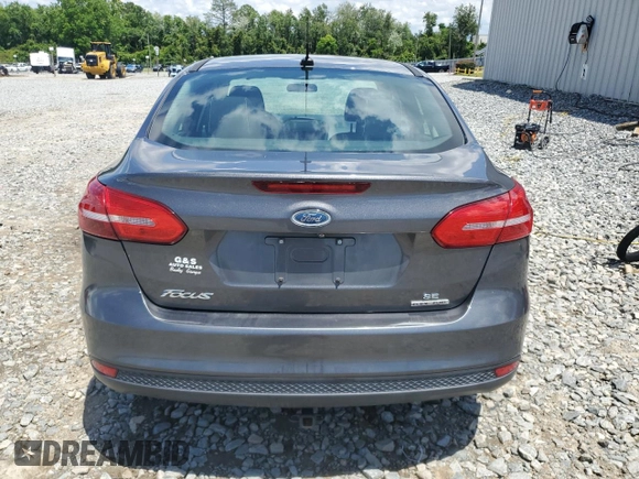 2016 Ford Focus SE with VIN 1FADP3F29GL233719, listed as a Copart auction lot 56857705 with 140,785 mi miles and Salvage title. Bid and sale history available at DreamBid. Image 6.