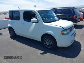 2010 Nissan Cube S z VIN JN8AZ2KR1AT150348, wystawiony jako IAAI lot #42054036 z przebiegiem 165 425 mil mil oraz . Historia ofert i sprzedaży dostępna na DreamBid. Obrazek 1.