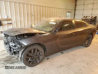 2019 Dodge Charger SXT with VIN 2C3CDXBG2KH684833, listed as a Copart auction lot 86397754 with 65,476 mi miles and Clean title. Bid and sale history available at DreamBid. Image 1.