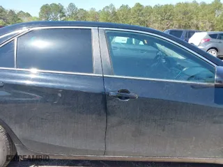 2016 Toyota Camry XLE with VIN 4T4BF1FK8GR584657, listed as a IAAI auction lot 41994436 with 212,401 mi miles. Bid and sale history available at carsss.com. Image 13.