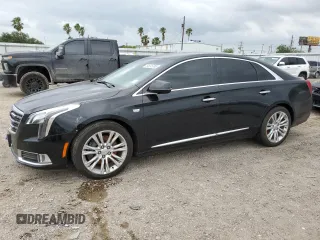 2018 Cadillac XTS Luxury z VIN 2G61M5S36J9134289, wystawiony jako Copart lot #54615065 z przebiegiem 140 064 mil mil oraz Szkoda całkowita • Salvage title. Historia ofert i sprzedaży dostępna na DreamBid. Obrazek 1.