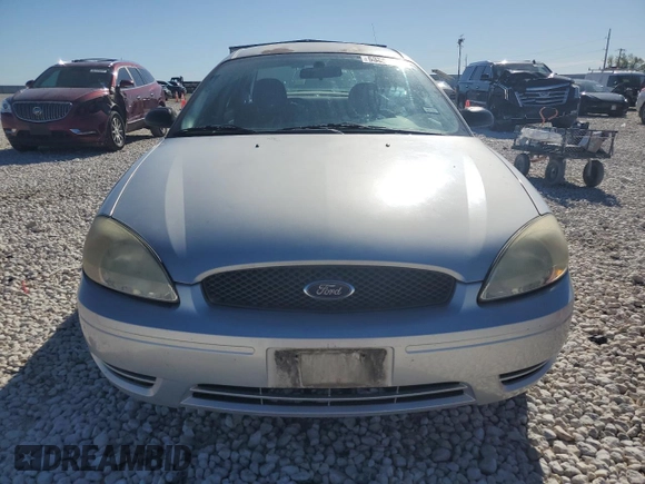 2005 Ford Taurus SE with VIN 1FAFP53U75A302281, listed as a Copart auction lot 53552465 with 100,413 mi miles and Salvage Title. Bid and sale history available at carsss.com. Image 5.